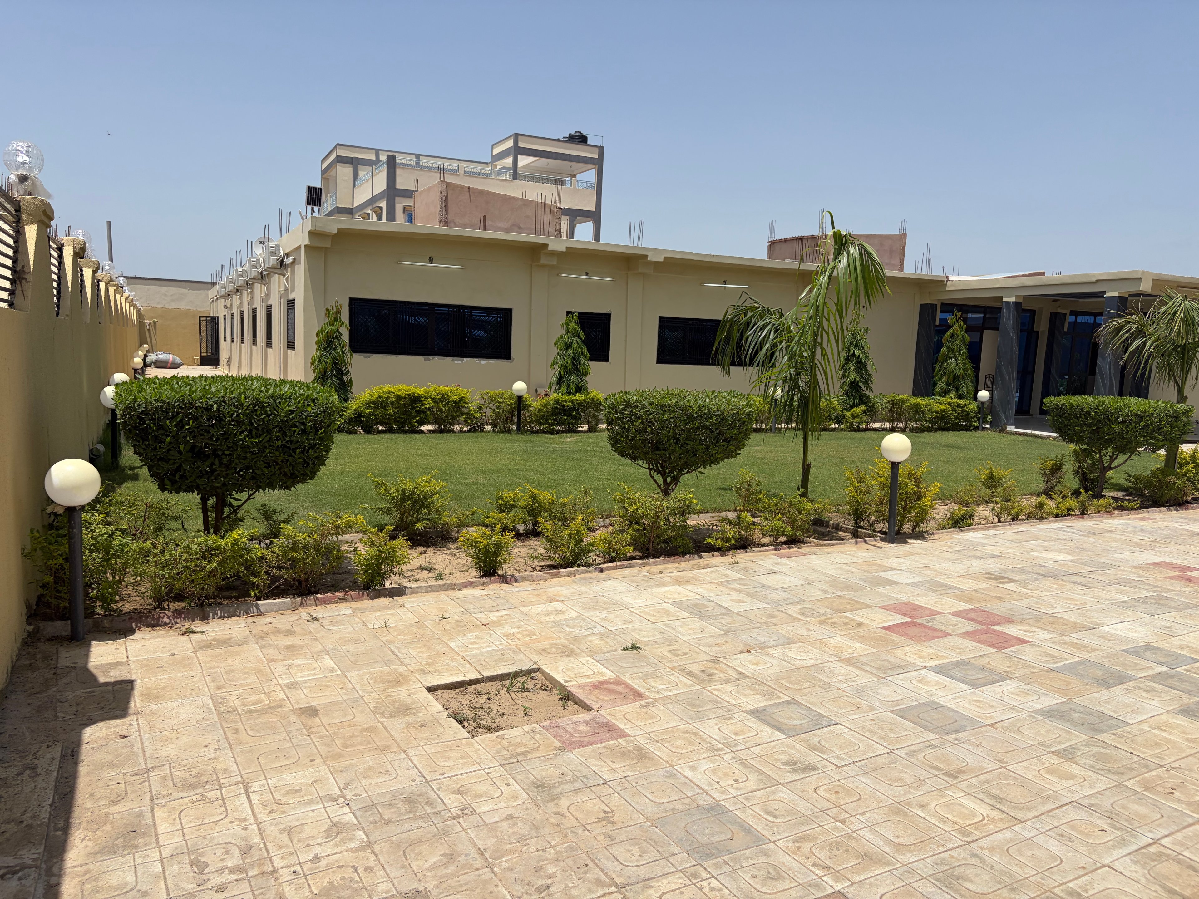 Les jardins et les résidences de Select-Hotel à Toukra